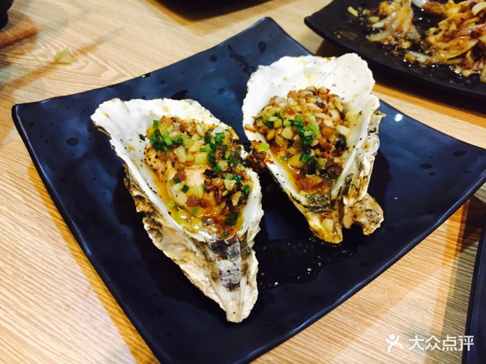 禾泽铁板料理蒜香生蚝图片 - 第1张