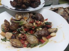 辣炒黑蚬子-皇朝海鲜酒店