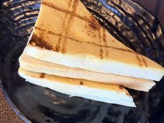 -曼听小寨海鲜烧烤·大连辣炒大王(盖州街店)