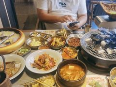 -草家酱蟹炭火烤肉店(珲春南路一店)