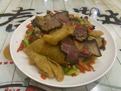 腊肉炒特色豆腐-文杰餐馆(南洪时尚风情街店)