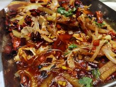 老坛酸萝卜炒肥肠-金百万烤鸭店(马甸店)