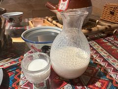 云南纂新奶白酒-火塘云南烧烤大排档