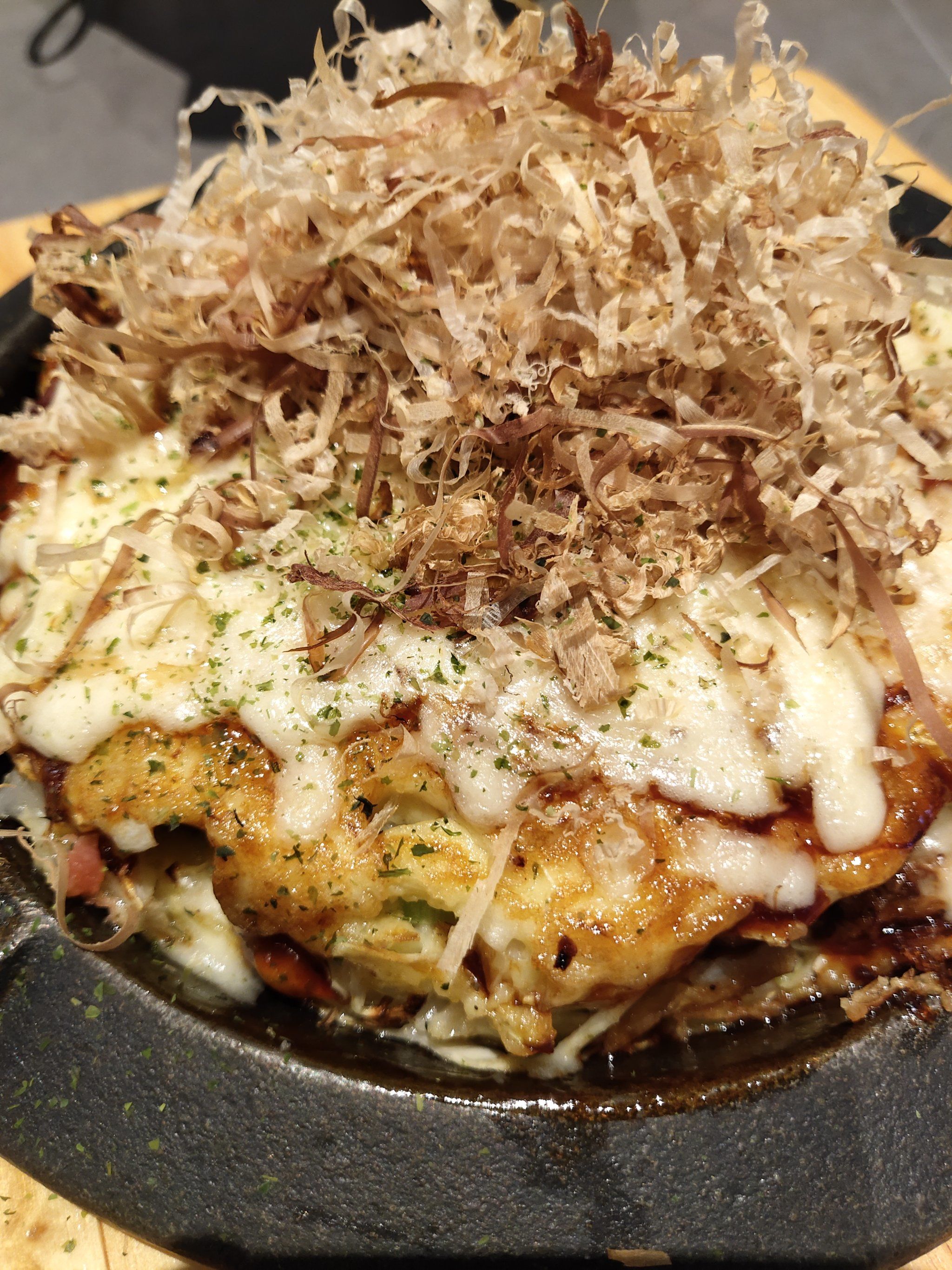 是一种日式蔬菜煎饼,为日本关西的一种民间