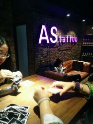 -鳌首刺青纹身 穿孔饰品店