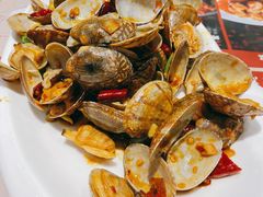 辣炒蚬子-添福来墨鱼饺子 · 海鲜东北菜(大连星海·黄浦路店)