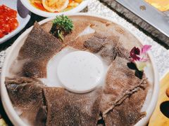 -老牌坊云南鱼豆花火锅(哈西万达店)