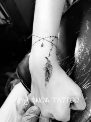 -SNOW TATTOO STUDIO