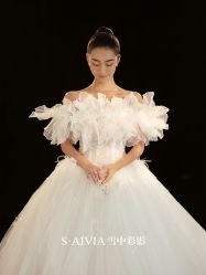 -雪中彩影婚纱摄影·微光艺术中心