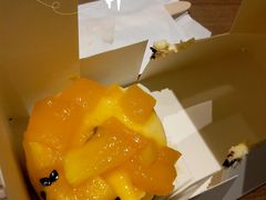 柠檬芝士蛋糕配芒果百香果酱-Wagas沃歌斯(浦东机场店)