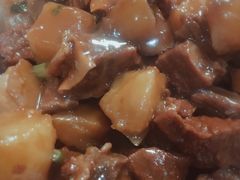 土豆烧牛腩-华春餐馆(鱼山路店)
