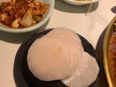 腌萝卜片-猪啊牛呀羊啊铜盘烤肉(正大广场店)