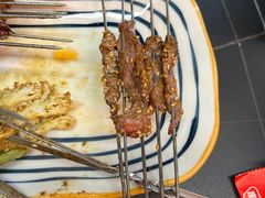 炭烤牛肉小串-许哥东北烧烤·铁丳烤串·宫后夹肉(繁花中心店)