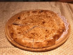 馕坑芝麻馕-巴扎美食·新疆菜·西域歌舞表演餐厅(新疆大厦店)