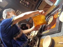 -老牌坊云南鱼豆花火锅(哈西万达店)