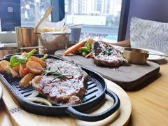 澳洲谷饲带骨肉眼牛排-候鸟等风来·精致西厨(万科第五城店)