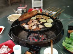 -彝人部落火盆烧烤(原内环足球场店)