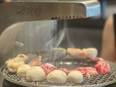 -草家酱蟹炭火烤肉店(珲春南路一店)