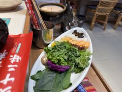 -老牌坊云南鱼豆花火锅(哈西万达店)