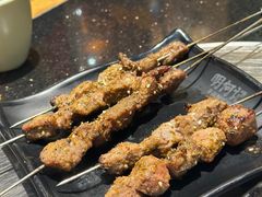 -明何记涮牛肚(品牌首店隋唐植物园南门古城路店)