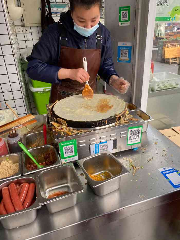 天津煎饼果子摊位图片