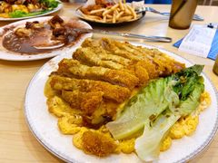 咖喱滑蛋吉列猪扒饭-传屋记茶餐厅(世纪年华店)