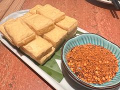 蒜香包浆豆腐-浩海火燒雲傣家菜(芮欧百货店)