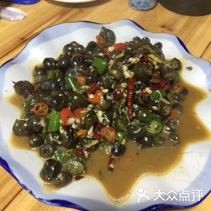 香香大排档炒螺丝图片