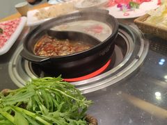 -明何记涮牛肚(品牌首店隋唐植物园南门古城路店)