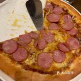 切一块西冷蘸油爆虾的蒜油，再卷上一叉子意面