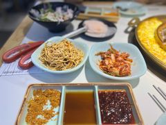 腌萝卜片-猪啊牛呀羊啊铜盘烤肉(正大广场店)