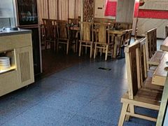 -明何记涮牛肚(品牌首店隋唐植物园南门古城路店)