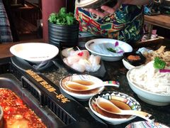 -老牌坊云南鱼豆花火锅(哈西万达店)