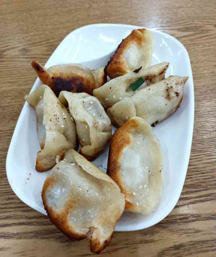 胡记锅贴-"离家不算远的一家锅贴店,在中庚城附近,很.