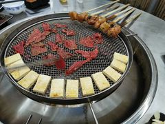 -彝人部落火盆烧烤(原内环足球场店)