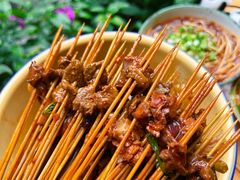 -拈签一笑黄牛肉辣卤串串