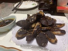 香煎羊血肠-蒙古人烤羊大师·绿野餐厅(工农大路店)