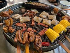 -彝人部落火盆烧烤(原内环足球场店)