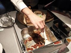 沙茶牛腩锅底-左庭右院鲜牛肉火锅黑金店(陆家嘴中心店)
