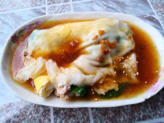 鹏记肠粉王-"棉城老字号 鹏记肠粉王水门桥底的一间小.