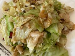 牛心菜爆螺片-老苏扬饭店