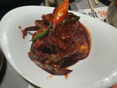 草家招牌酱辣蟹-草家酱蟹炭火烤肉店(珲春南路一店)
