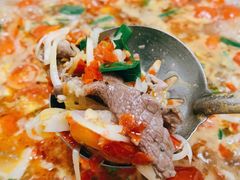 -黄利砖万峰林布依特色酸笋牛肉馆