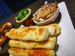 虾酱卷子-渔民船说·北塘海鲜·天津菜·海肠捞饭(北塘古镇店)