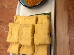 蒜香包浆豆腐-浩海火燒雲傣家菜(芮欧百货店)