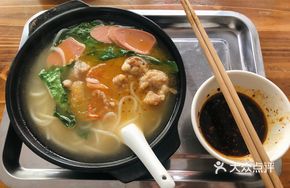 Succulent Pork with Rice Noodles in Broth