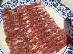 大刀现切鲜羊后腿-一只羊·铜锅涮羊肉烧烤