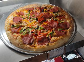 披萨，比中等偏上的水准，就是很正常的味道，没什么亮点