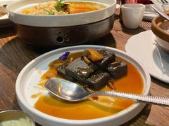 猴头菇鲍汁瑶柱扒制黑豆腐-肴约·花园式餐厅(湖里店)