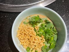 -明何记涮牛肚(品牌首店隋唐植物园南门古城路店)
